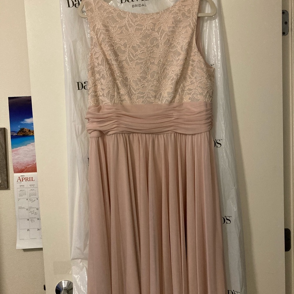 Semi-Formal knee length gown.Blush color